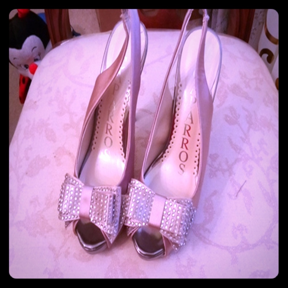 Women blush pink shoes